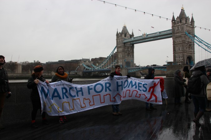 The March for Homes finished with a rally at City Hall.