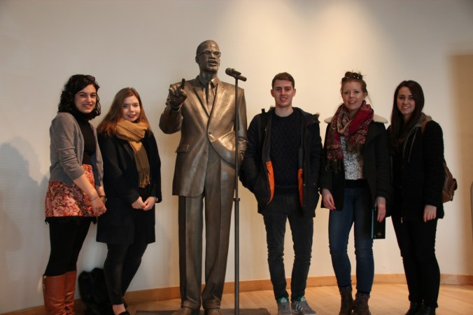 My students with a statue of Malcolm X at the Shabazz Centre.
