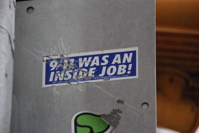 Other issues are unique to the US, such as this sticker declaring that 9/11 was the result of a conspiracy. It looks as if it has been scratched with a key or something similar in an attempt to obscure the image, suggesting the controversy of this kind of opinion.