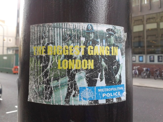 The previous two stickers refer to police in general. This sticker refers to the Metropolitan Police specifically, calling it the biggest gang in London (Gordon Street, Bloomsbury, 12/03/15).
