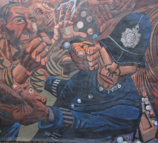 Detail of a policeman fighting with protesters in the Cable Street Mural.